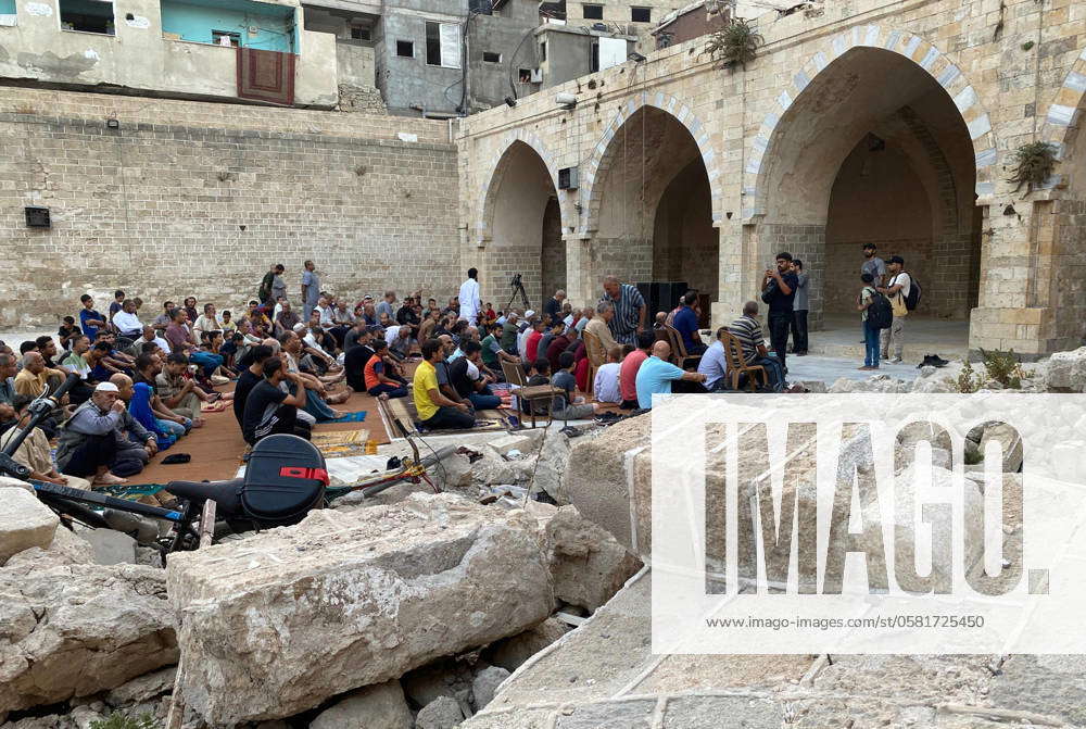 Palestinians hold Eid al-Adha prayers by the next to Al-Omari Mosque ...