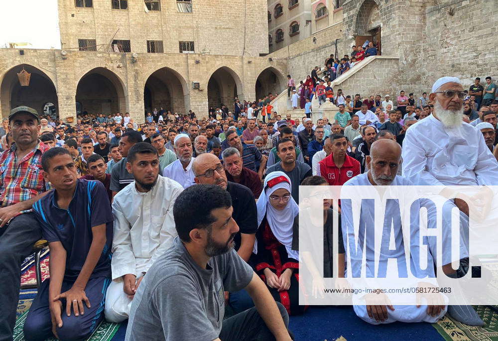 Palestinians hold Eid al-Adha prayers by the next to Al-Omari Mosque ...