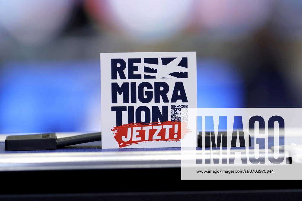 A sticker Remigration Now on display at the 15 Federal Party Conference ...