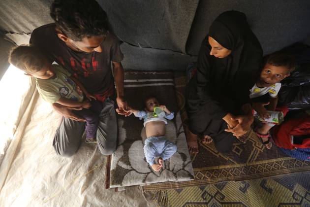 Noura Abu Al-Saud, a displaced Palestinian, lives in a tent inside a ...