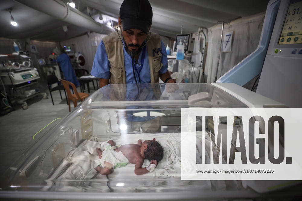 Hamas Israel Conflict A doctor is checking a baby lying in an incubator ...