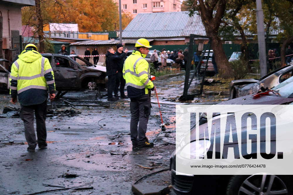 Russian Drone Attack - Kyiv Law enforcers in high-viz vests are at the ...