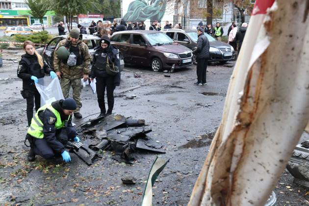 Russian Drone Attack - Kyiv Law enforcers pick up the fragments of a ...