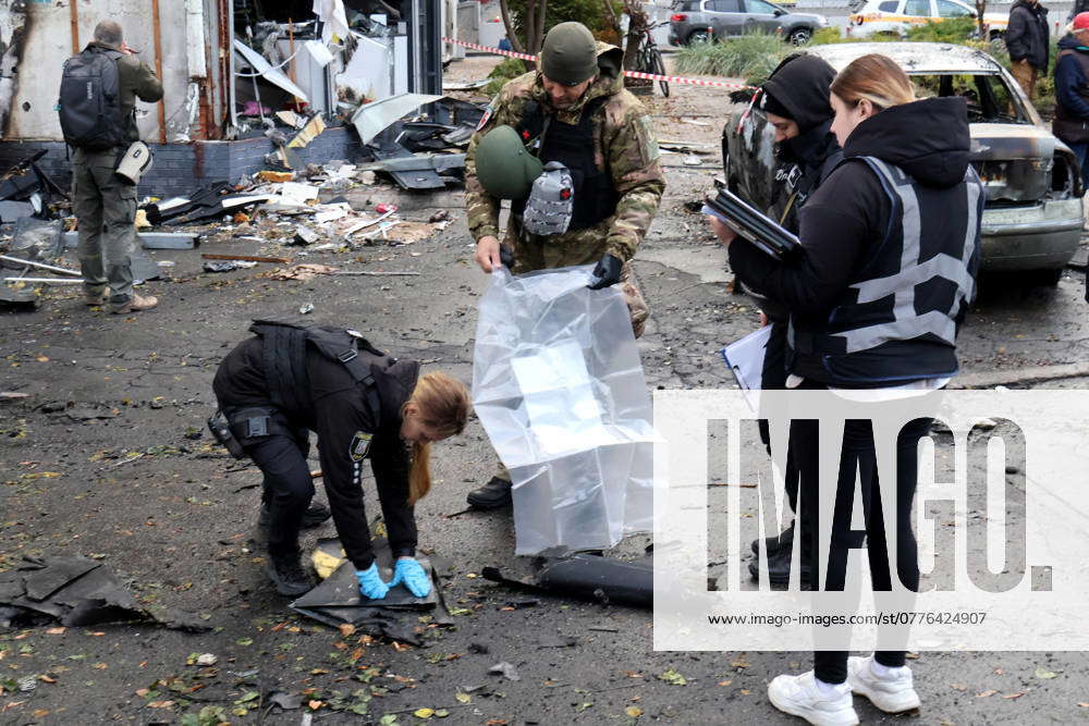 Russian Drone Attack - Kyiv Law enforcers pick up the fragments of a ...