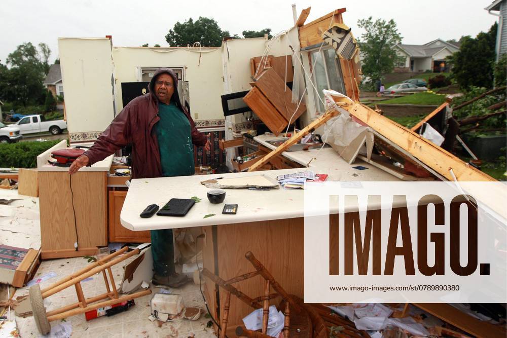 Storm damage in St. Charles, Missouri Wilburn Shaw looks for personal ...