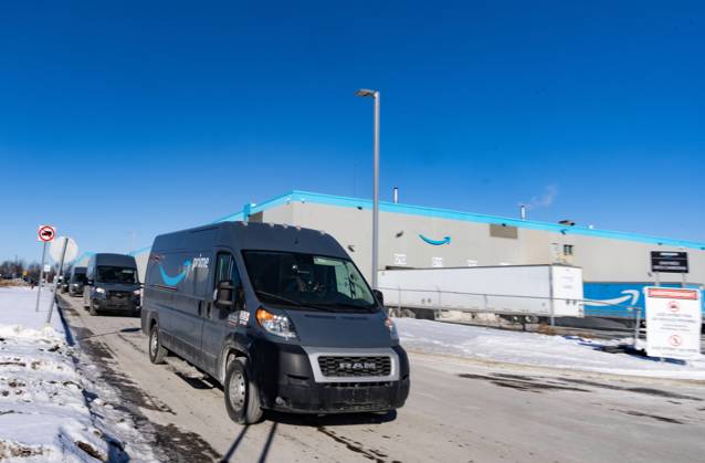 Laval, Pq, CANADA: Amazon delivery trucks leave Amazon s DXT4 warehouse ...
