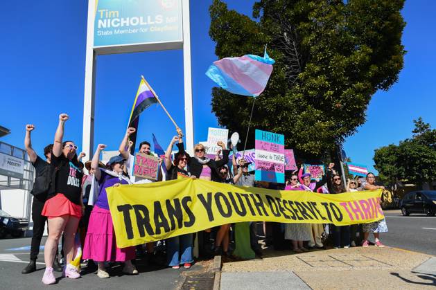 Will Nicholls Rally TRANS RALLY BRISBANE, Activists stand outside the office of Queensland ...