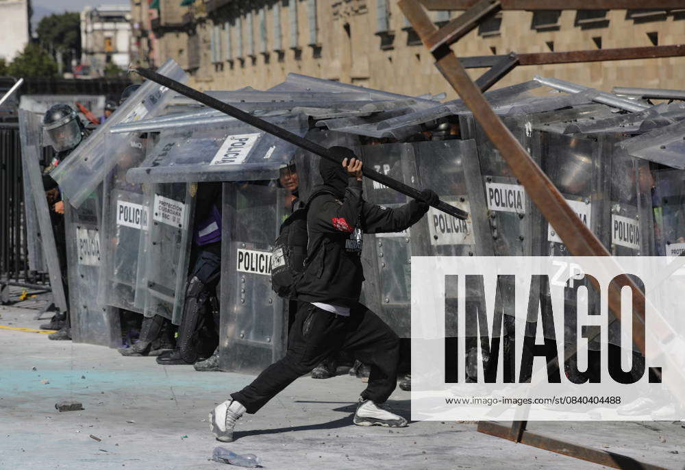 Gen Z Riot in Mexico City, Mexico: A person confronts riot police during the Gen Z ...